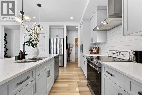 47 Walgrove Park Se, Calgary, AB - Indoor Photo Showing Kitchen With Stainless Steel Kitchen With Double Sink With Upgraded Kitchen