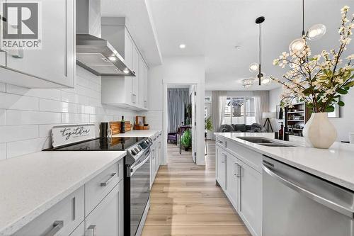 47 Walgrove Park Se, Calgary, AB - Indoor Photo Showing Kitchen With Double Sink With Upgraded Kitchen