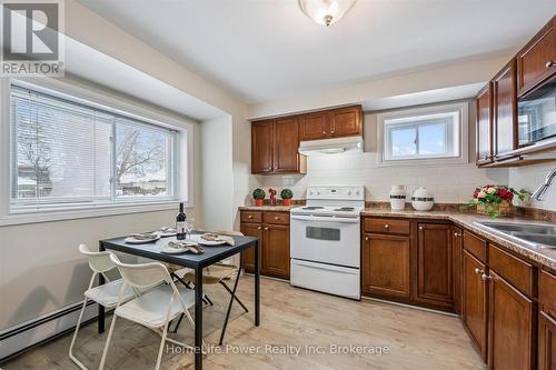 Unit A - 319 Victoria Street S, Kitchener, ON - Indoor Photo Showing Kitchen With Double Sink