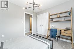 Bedroom with a chandelier and a closet - 