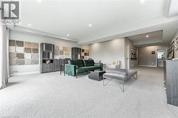 Living area featuring carpet and recessed lighting - 