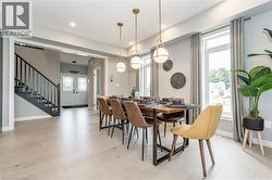 Dining area with stairway, recessed lighting, and light wood-type flooring - 
