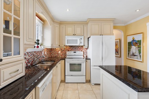 Kitchen - 486 Rue Donatien, Laval (Fabreville), QC - Indoor Photo Showing Kitchen With Double Sink