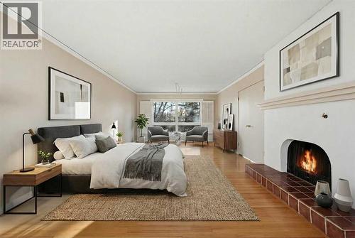 327 Willow Ridge Place Se, Calgary, AB - Indoor Photo Showing Bedroom With Fireplace