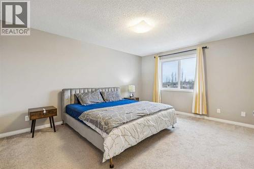 71 Walden Manor Se, Calgary, AB - Indoor Photo Showing Bedroom