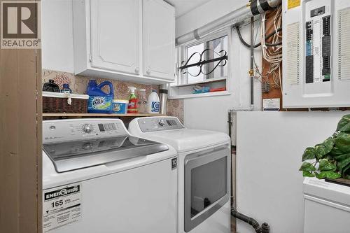 Laundry in Basement - 16 Rundleson Way Ne, Calgary, AB - Indoor Photo Showing Laundry Room