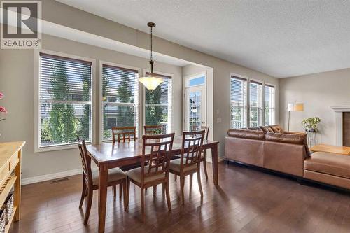 224 Panamount Point Nw, Calgary, AB - Indoor With Fireplace