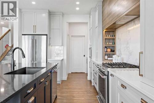 656 Bayview Way Sw, Airdrie, AB - Indoor Photo Showing Kitchen With Upgraded Kitchen