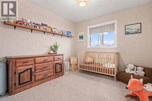 43 Sunset Crescent, Okotoks, AB - Indoor Photo Showing Bedroom
