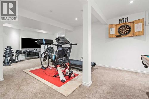 43 Sunset Crescent, Okotoks, AB - Indoor Photo Showing Gym Room