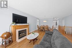 Hardwood flooring throughout the main level. - 