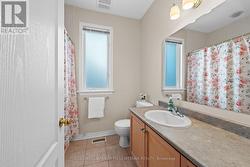 Main floor 4 pc full bathroom. - 