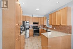 Peninsula style kitchen w tons of storage space! - 