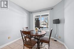 Kitchen eating area w window facing Verandah. - 