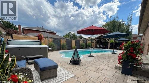 565 Harmony Avenue, Burlington, ON - Outdoor With In Ground Pool With Deck Patio Veranda