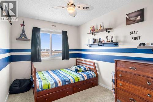 17 Cranford Place Se, Calgary, AB - Indoor Photo Showing Bedroom