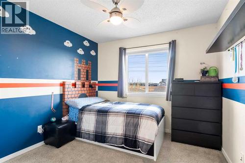 17 Cranford Place Se, Calgary, AB - Indoor Photo Showing Bedroom