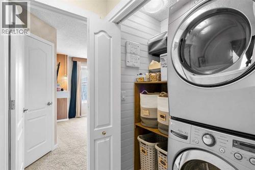 17 Cranford Place Se, Calgary, AB - Indoor Photo Showing Laundry Room