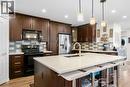 17 Cranford Place Se, Calgary, AB  - Indoor Photo Showing Kitchen With Upgraded Kitchen 