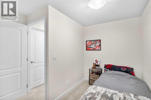17 Cranford Place Se, Calgary, AB - Indoor Photo Showing Bedroom
