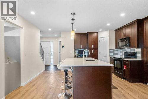 17 Cranford Place Se, Calgary, AB - Indoor Photo Showing Kitchen With Upgraded Kitchen
