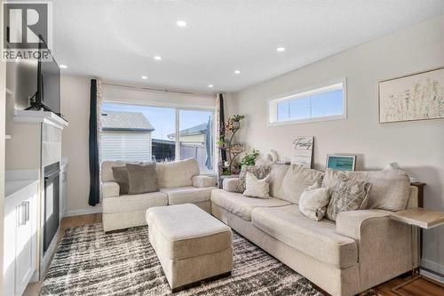 17 Cranford Place Se, Calgary, AB - Indoor Photo Showing Living Room
