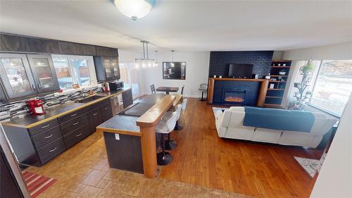 325 4Th Avenue, Kimberley, BC - Indoor Photo Showing Other Room With Fireplace