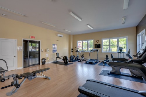 Salle d'exercice - 310-1450 Av. De Rochechouart, Saint-Jérôme, QC - Indoor Photo Showing Gym Room