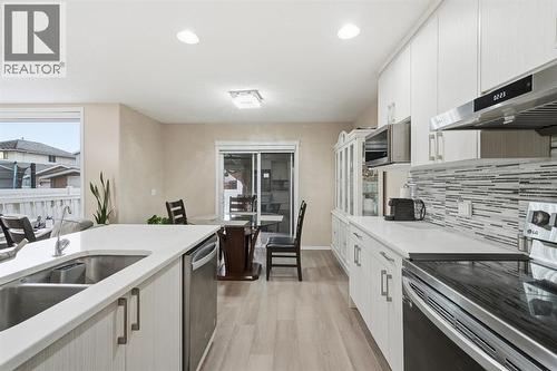 131 San Fernando Crescent Ne, Calgary, AB - Indoor Photo Showing Kitchen With Double Sink With Upgraded Kitchen