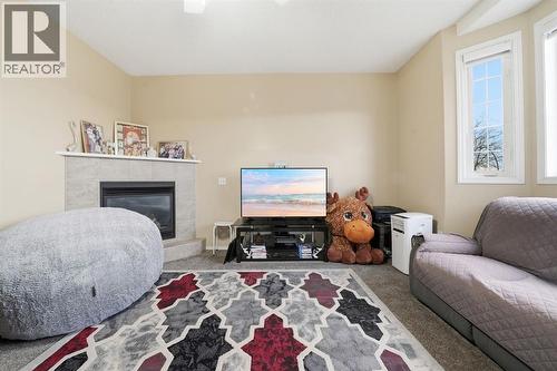 131 San Fernando Crescent Ne, Calgary, AB - Indoor With Fireplace