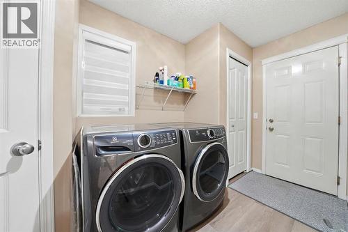 131 San Fernando Crescent Ne, Calgary, AB - Indoor Photo Showing Laundry Room