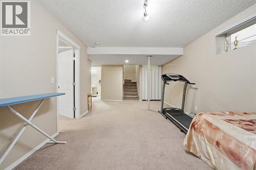 131 San Fernando Crescent Ne, Calgary, AB - Indoor Photo Showing Gym Room