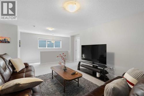 33 Walcrest Way Se, Calgary, AB - Indoor Photo Showing Living Room