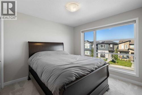 33 Walcrest Way Se, Calgary, AB - Indoor Photo Showing Bedroom