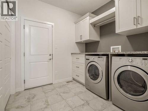 98 Moonlight Boulevard W, Lethbridge, AB - Indoor Photo Showing Laundry Room
