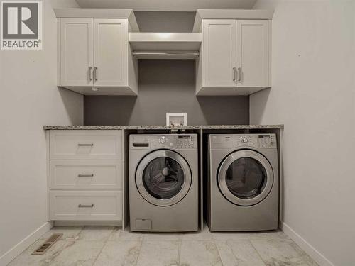 98 Moonlight Boulevard W, Lethbridge, AB - Indoor Photo Showing Laundry Room