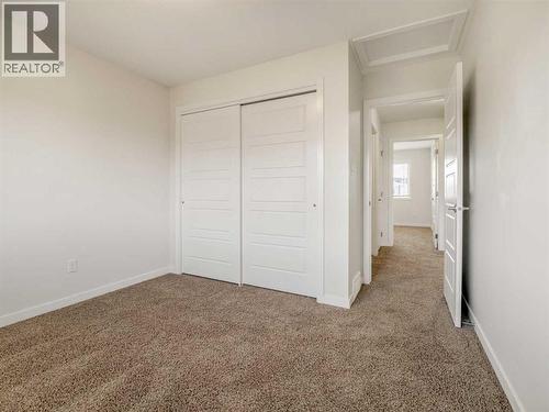 98 Moonlight Boulevard W, Lethbridge, AB - Indoor Photo Showing Other Room