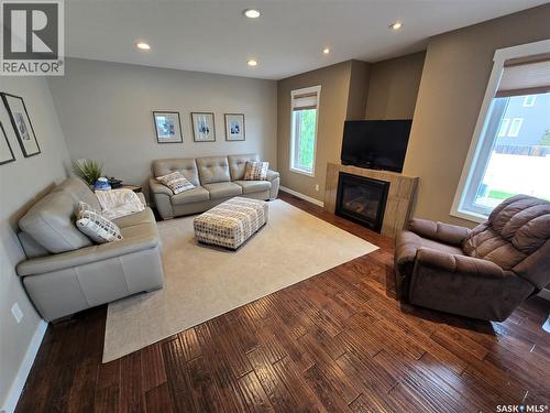 721 Barber Crescent, Weyburn, SK - Indoor Photo Showing Living Room With Fireplace