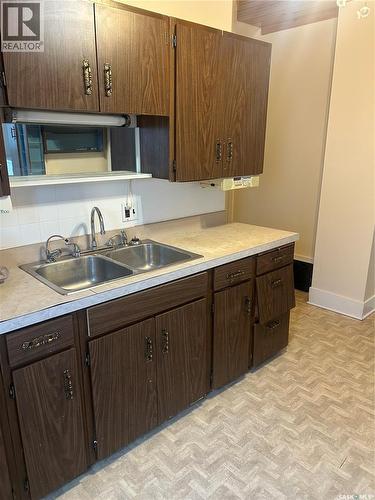 236 12Th Street E, Prince Albert, SK - Indoor Photo Showing Kitchen With Double Sink
