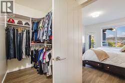 Walk-thru closet in primary with built-ins - 