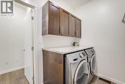 Full laundry room with access to the garage - 