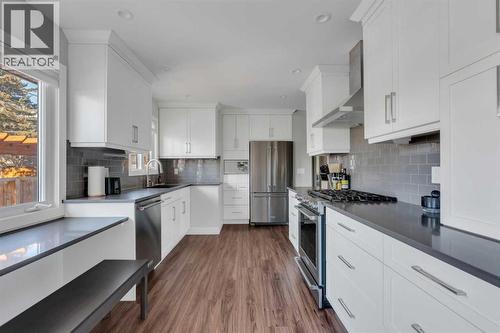 19 Garrick Drive Sw, Calgary, AB - Indoor Photo Showing Kitchen With Stainless Steel Kitchen With Upgraded Kitchen