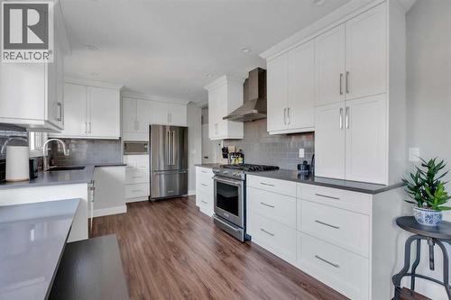 19 Garrick Drive Sw, Calgary, AB - Indoor Photo Showing Kitchen With Stainless Steel Kitchen With Upgraded Kitchen