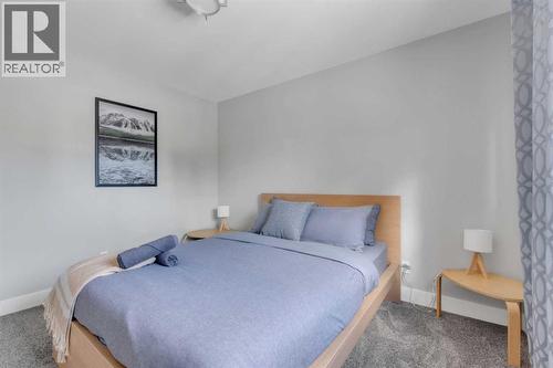 19 Garrick Drive Sw, Calgary, AB - Indoor Photo Showing Bedroom