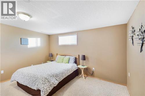 272210 Range Road 291  Ne, Airdrie, AB - Indoor Photo Showing Bedroom