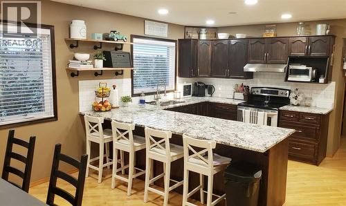 272210 Range Road 291  Ne, Airdrie, AB - Indoor Photo Showing Kitchen