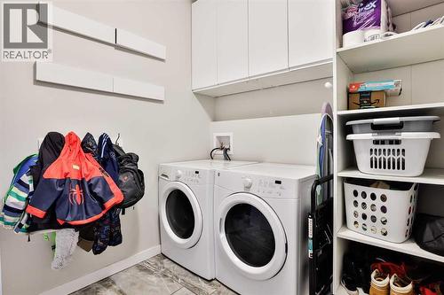 128 Cabot Landing W, Lethbridge, AB - Indoor Photo Showing Laundry Room
