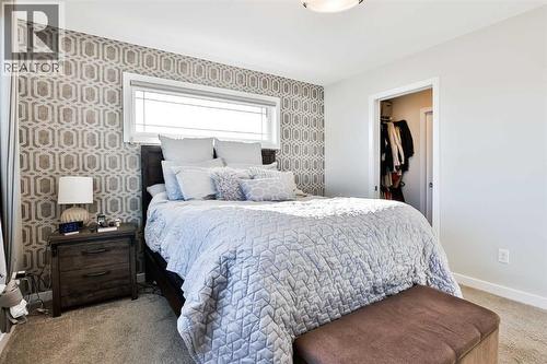 128 Cabot Landing W, Lethbridge, AB - Indoor Photo Showing Bedroom