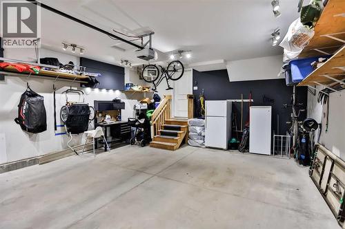 128 Cabot Landing W, Lethbridge, AB - Indoor Photo Showing Garage