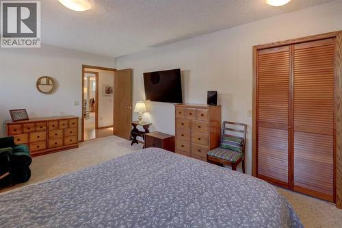 5943 Silver Ridge Drive Nw, Calgary, AB - Indoor Photo Showing Bedroom